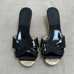 Jimmy Choo Black Patent Leather Mules
Some blemish at the metal part